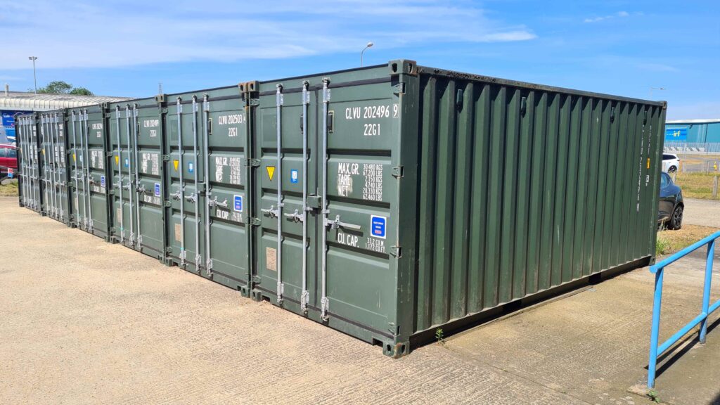 20ft containers in a row in a yard